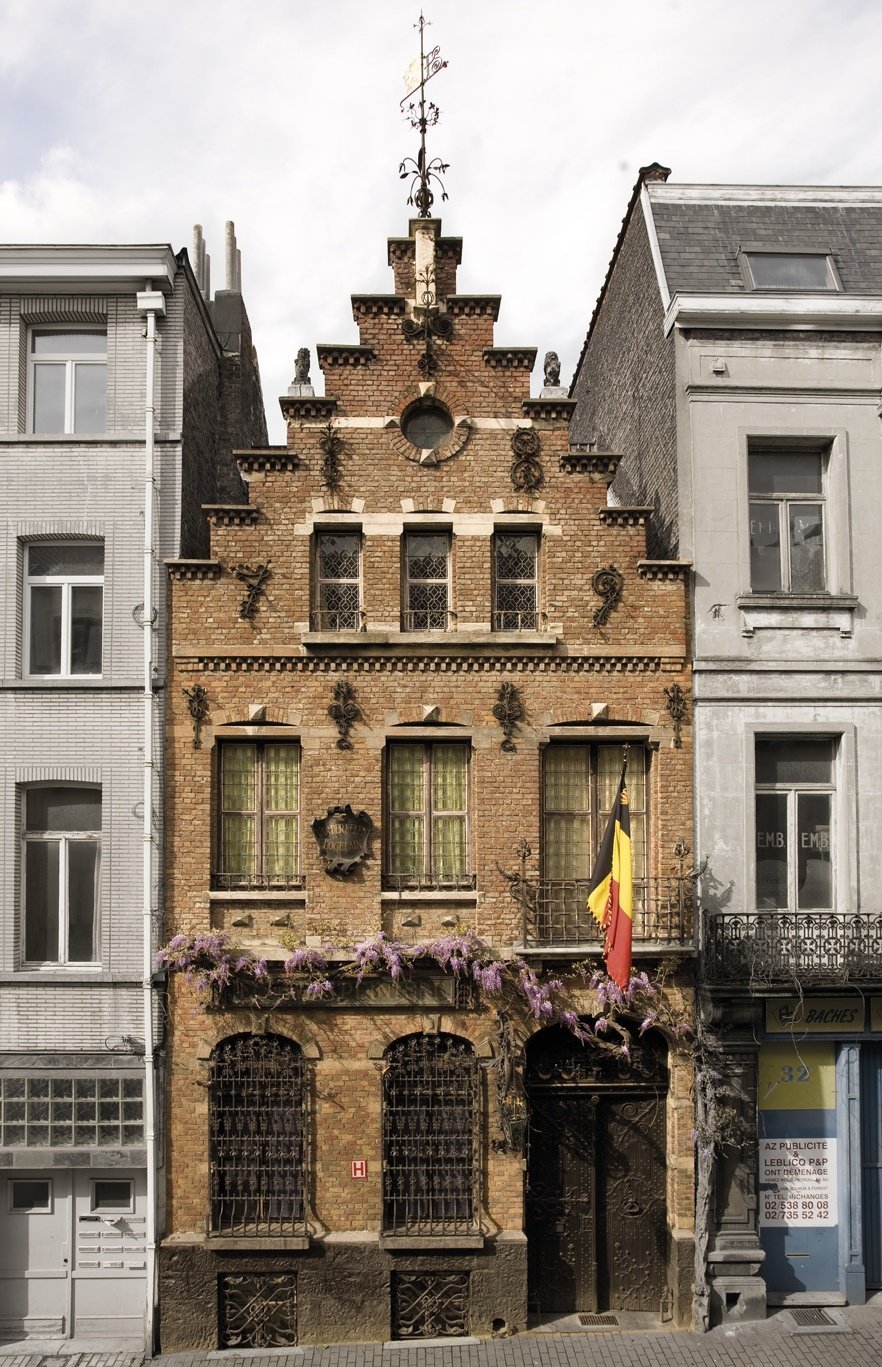 the facade of an old building in Brussels