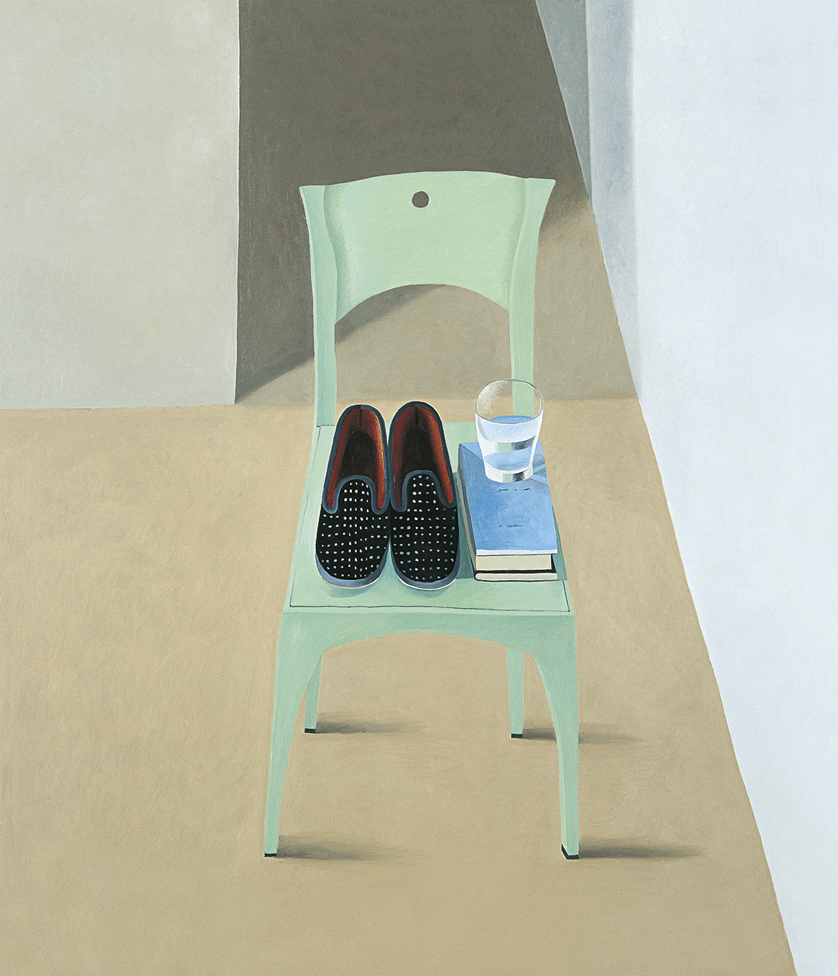 slippers with a glass and books on a chair